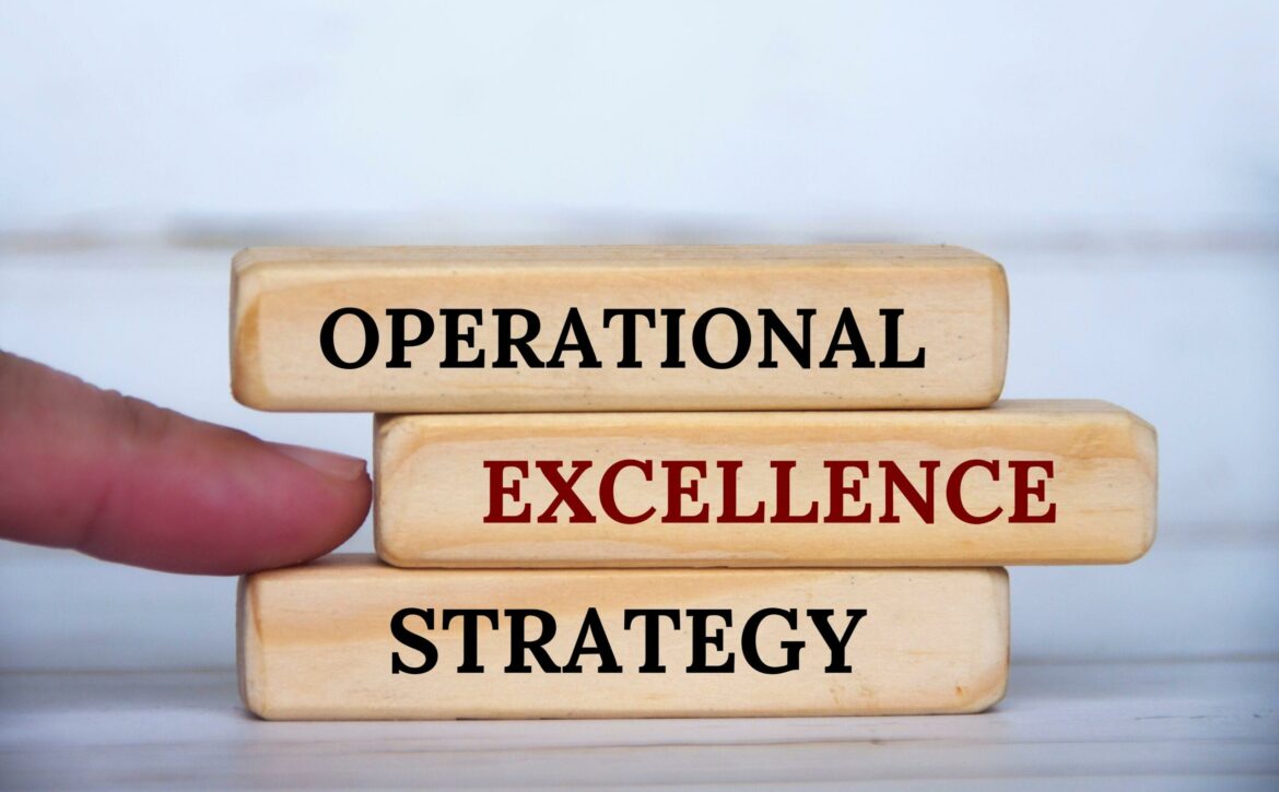 Hand,Pointing,Operational,Excellence,Strategy,Text,On,Wooden,Blocks.,Operational